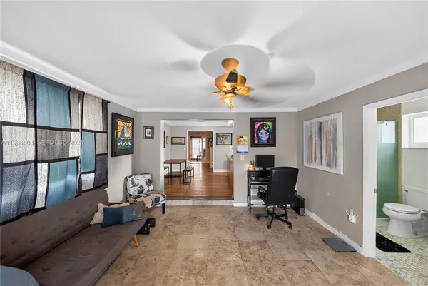a bedroom with a workspace