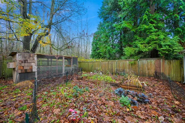 a backyard of a house with lots of green space