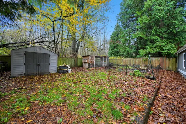a backyard of a house with lots of green space