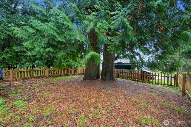 a view of a deck with a fence