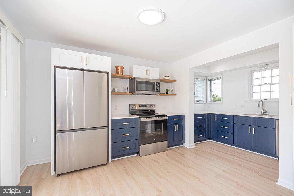 10429 Brighton Road Ocean City, MD 21842 - Photo 5 of 35 Modern kitchen with sleek finishes.