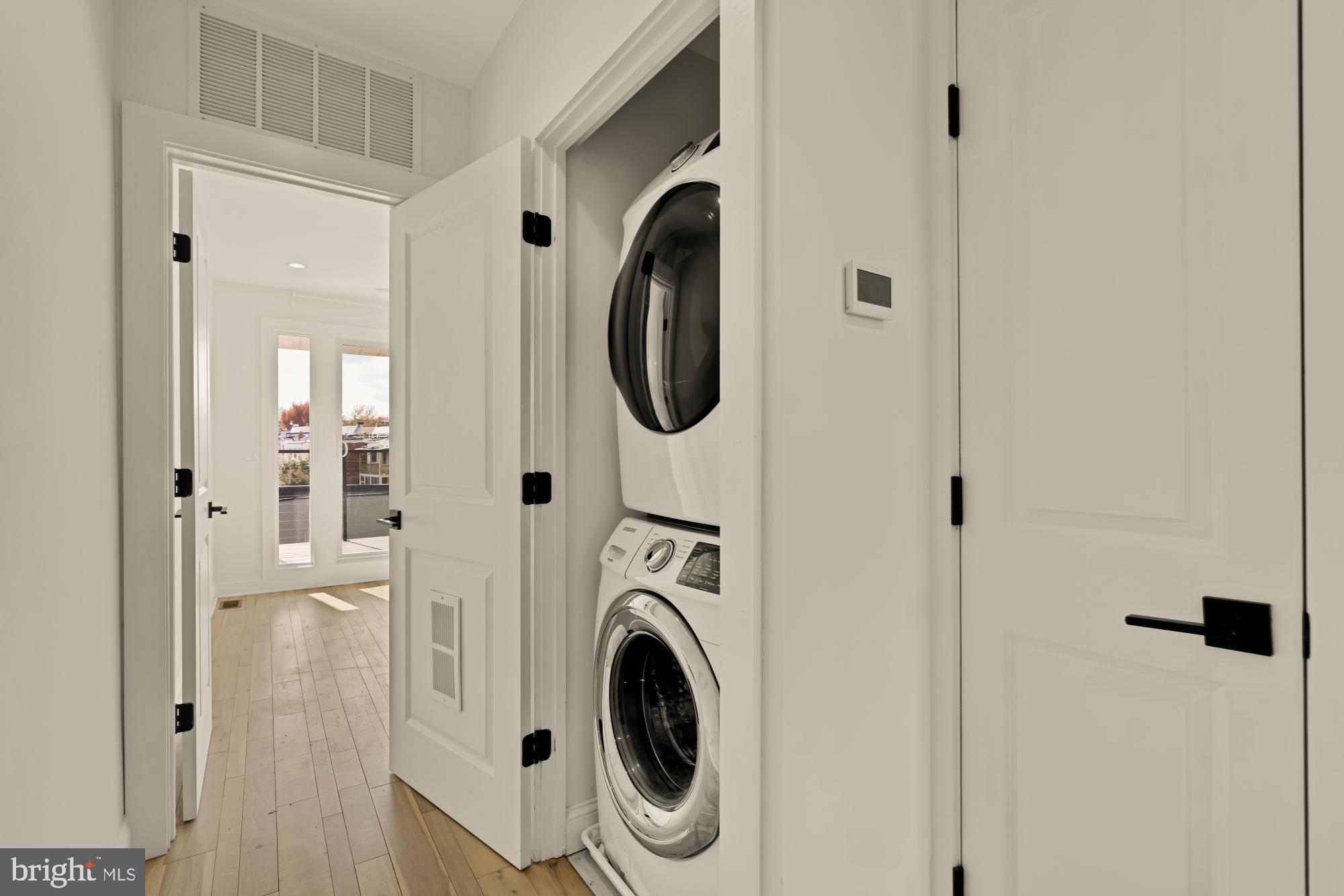 1310 Spring Road Northwest, Unit PHB Washington, DC 20010 - Photo 12 of 18 a utility room with dryer and washer