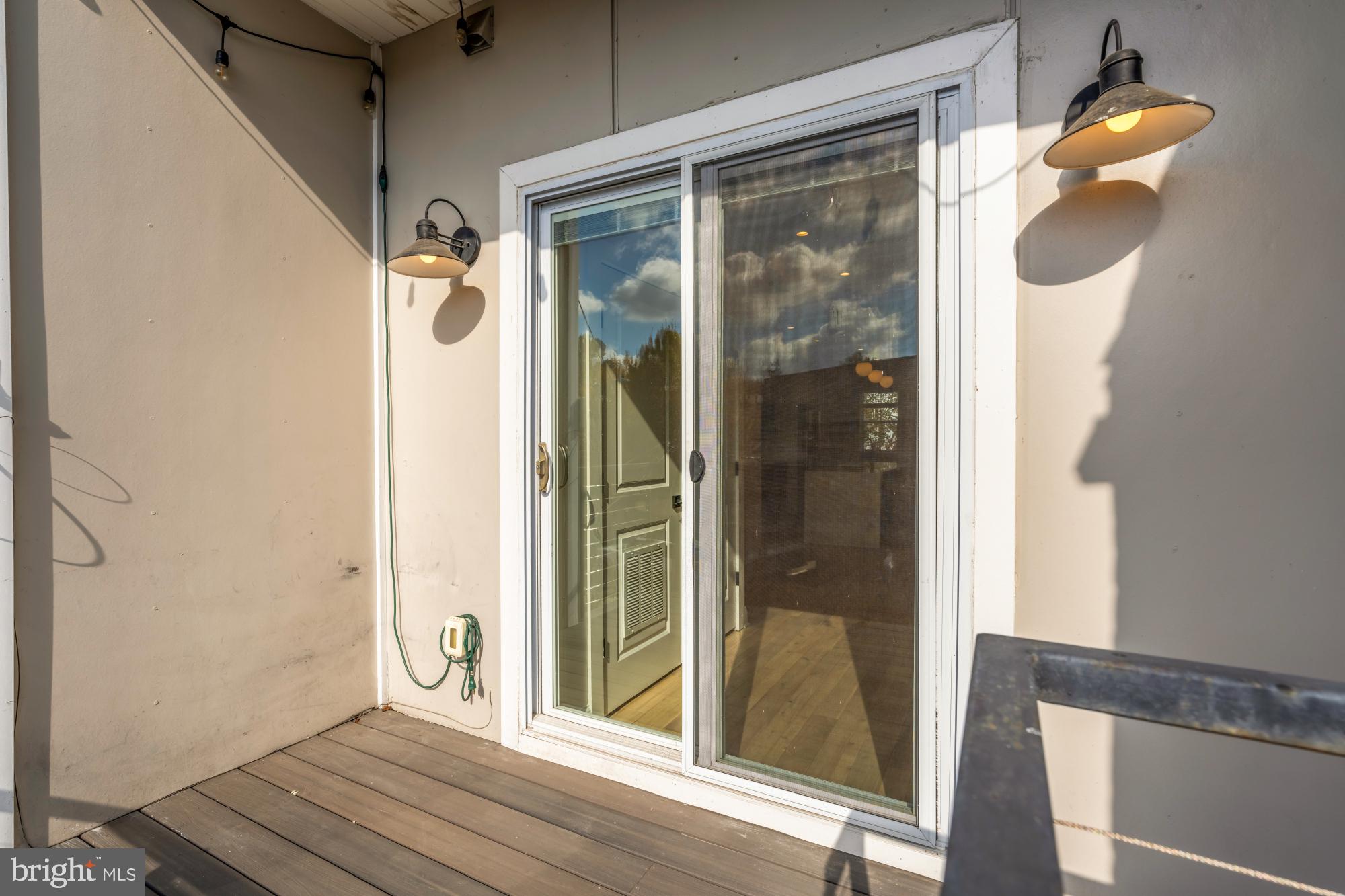1310 Spring Road Northwest, Unit PHB Washington, DC 20010 - Photo 10 of 18 a view of a bathroom with a glass door