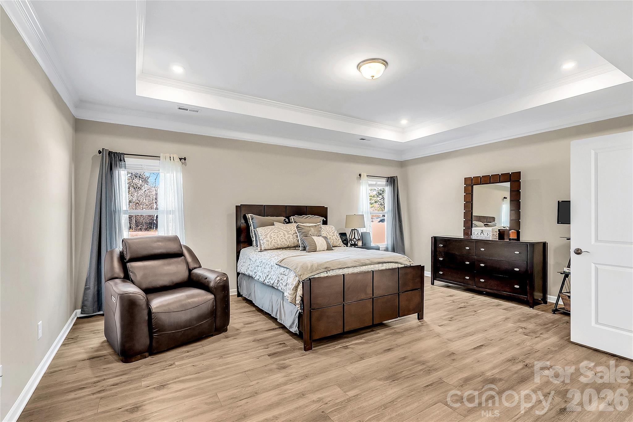 14421 Holbrooks Road Huntersville, NC 28078 - Photo 13 of 29 a bedroom with a bed and a couch