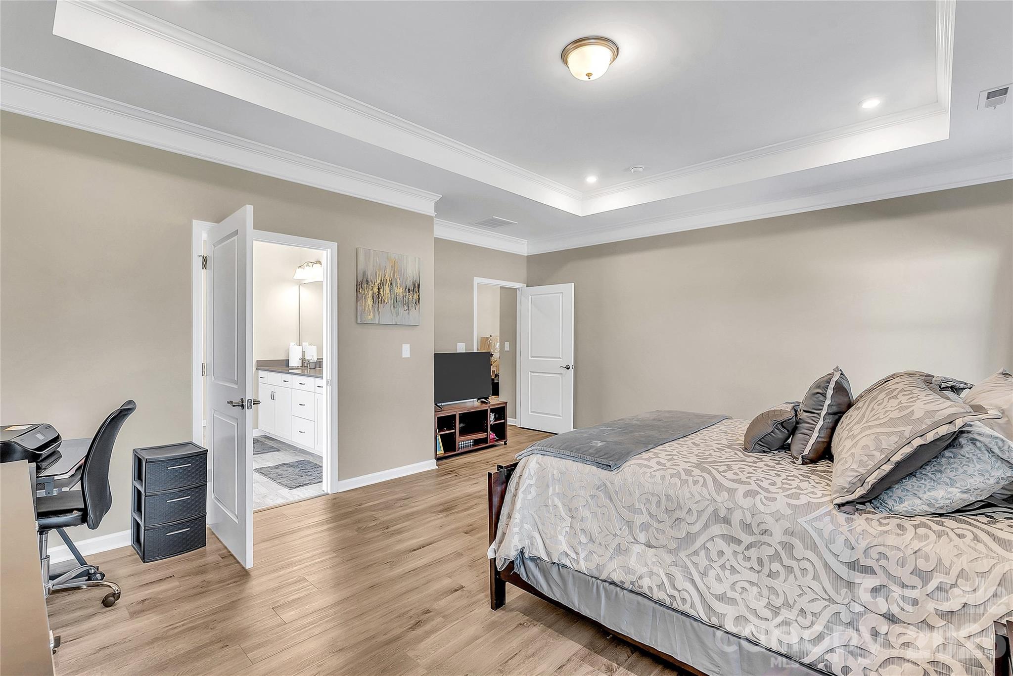 14421 Holbrooks Road Huntersville, NC 28078 - Photo 14 of 29 a bedroom with a bed and wooden floor