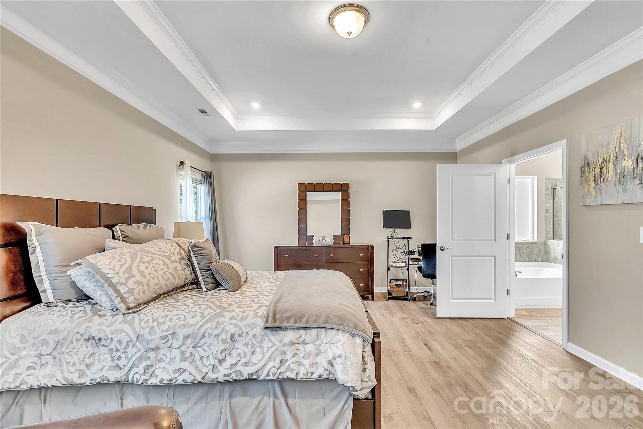 14421 Holbrooks Road Huntersville, NC 28078 - Photo 15 of 29 a bedroom with a large bed and furniture