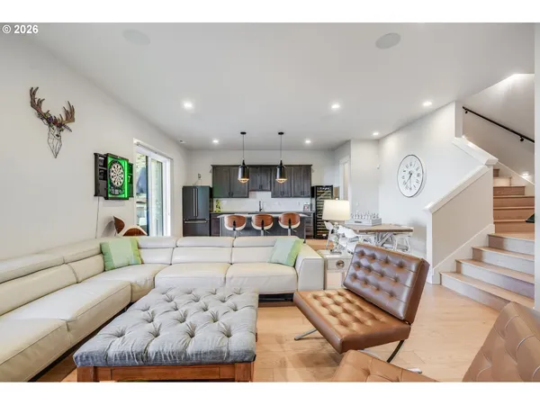a living room with furniture and a couch