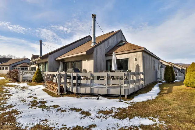 a view of a swimming pool with seating area