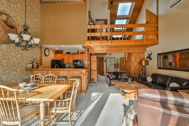 a front view of a building with sitting area