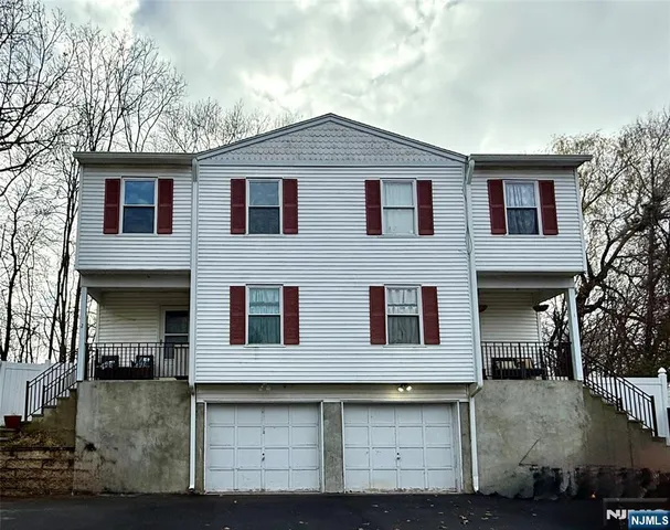 a front view of residential houses