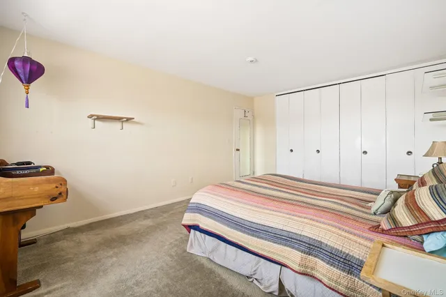 a kitchen with granite countertop a sink and steel appliances