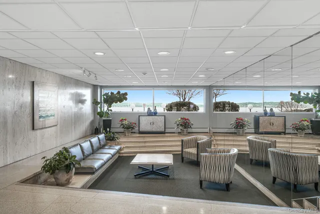 a view of a garden with an ocean view