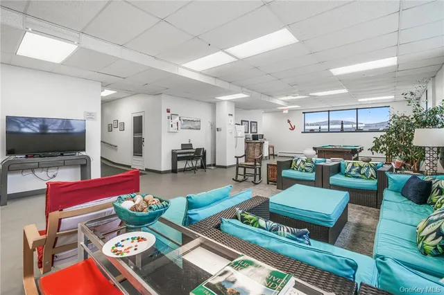a view of living room and kitchen