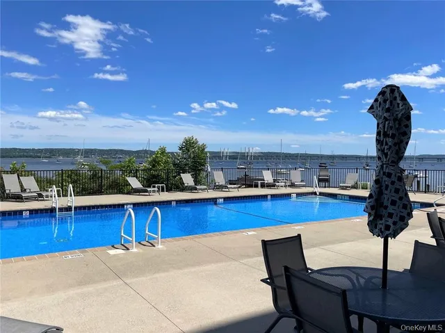 a view of a chairs and table in the terrace