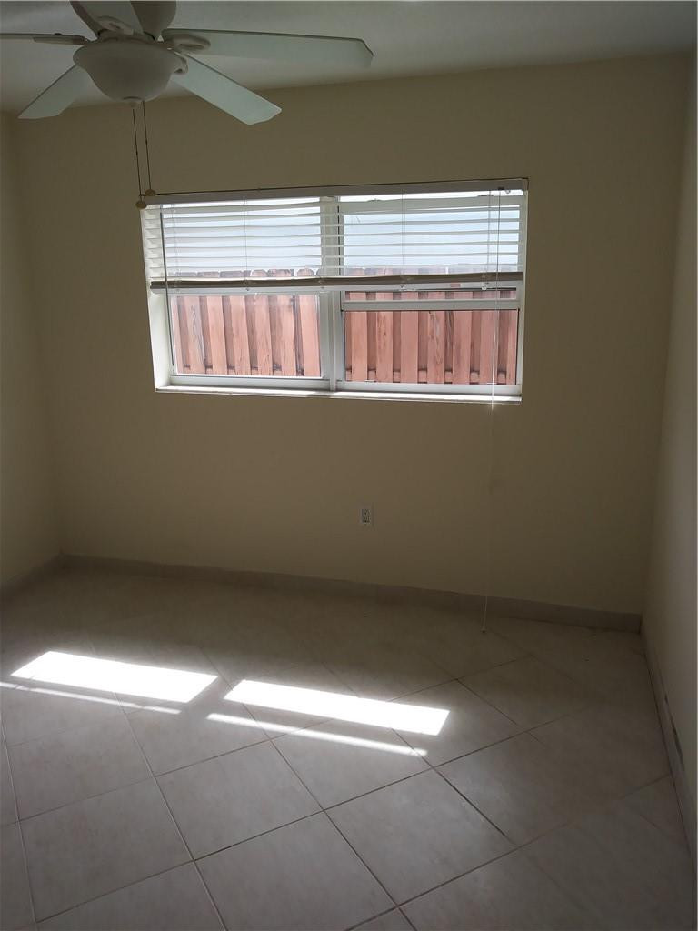 4508 West Park Road Hollywood, FL 33021 - Photo 11 of 13 a view of an empty room with a window