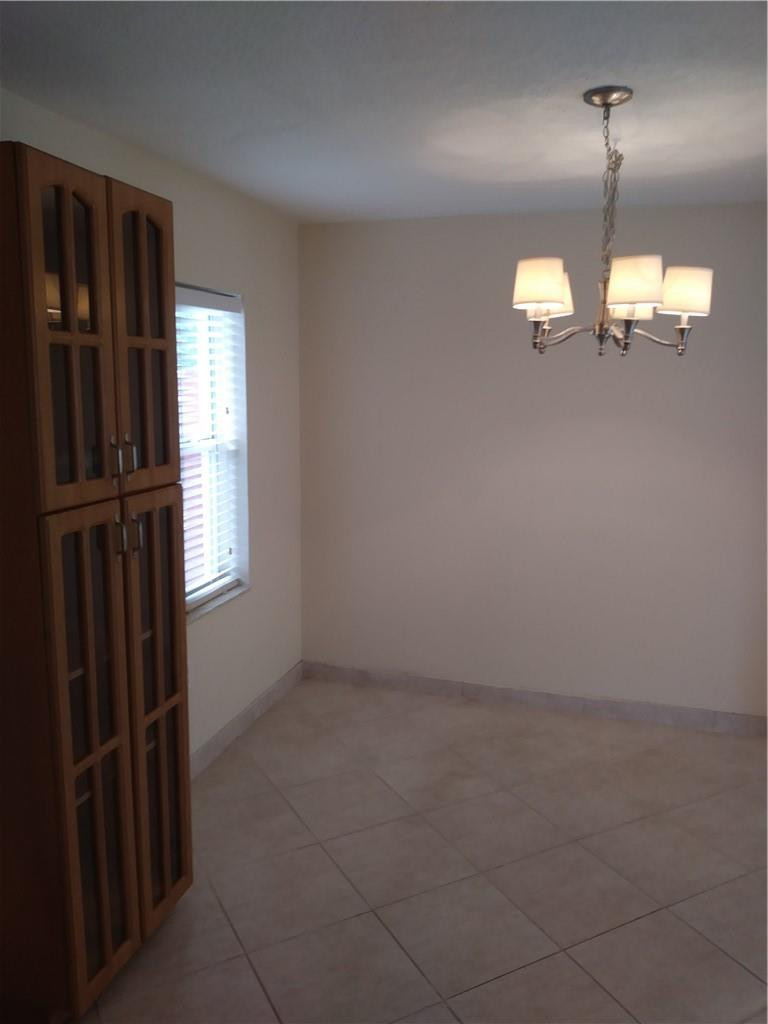 4508 West Park Road Hollywood, FL 33021 - Photo 4 of 13 wooden floor in an empty room