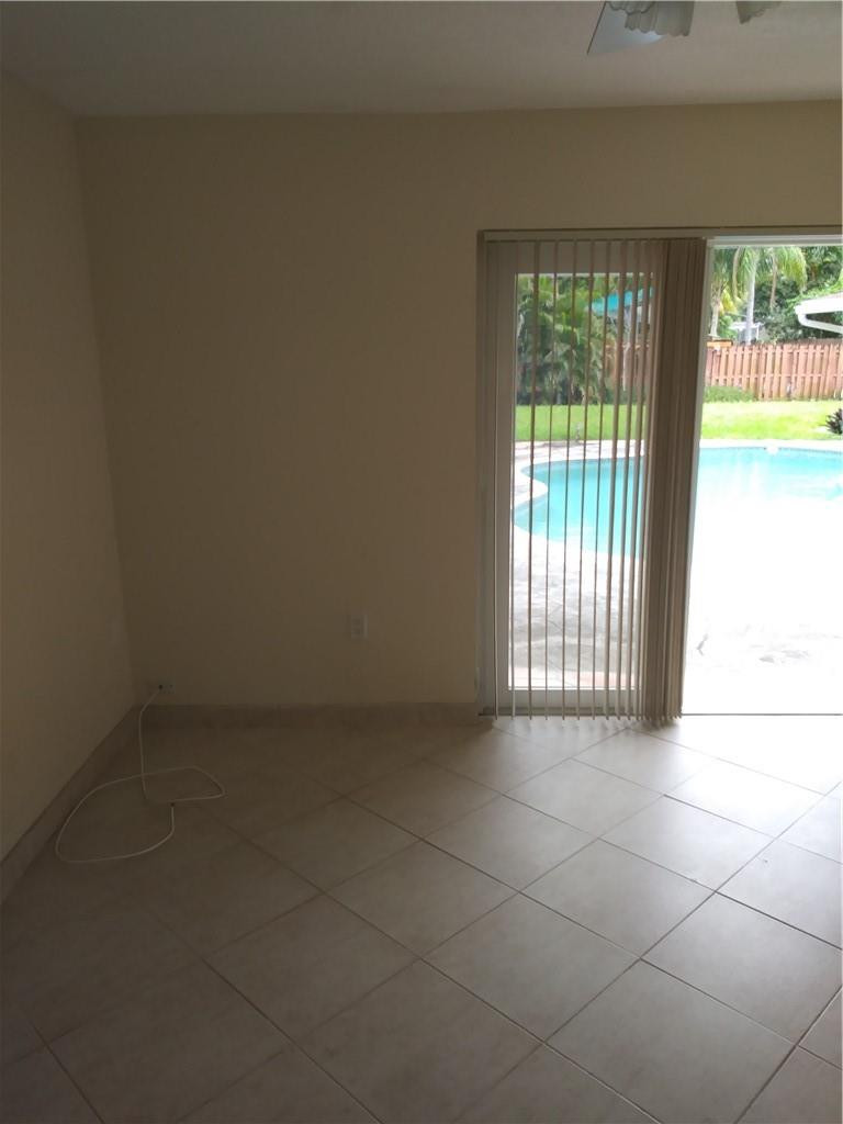 4508 West Park Road Hollywood, FL 33021 - Photo 7 of 13 a view of an empty room with a window