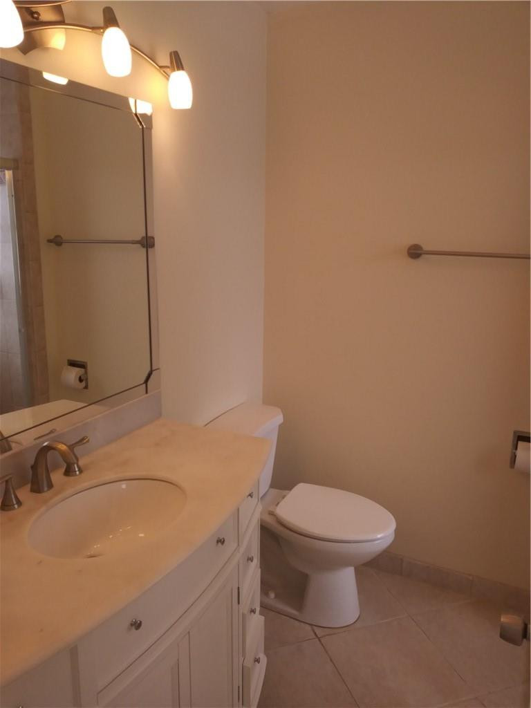 4508 West Park Road Hollywood, FL 33021 - Photo 8 of 13 a bathroom with a sink and a toilet