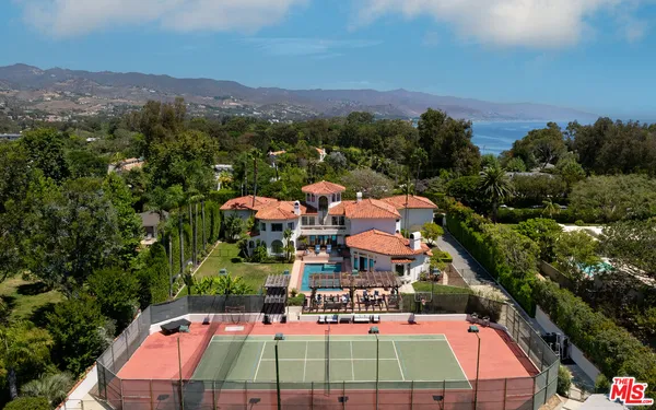 a front view of a house with a garage