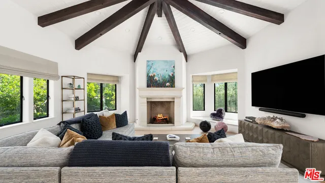 a view of entryway with wooden floor and stairs