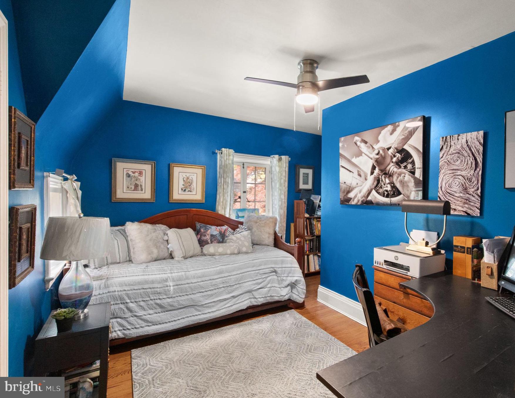 311 Taplow Road Baltimore, MD 21212 - Photo 21 of 32 a living room with furniture and wall paintings