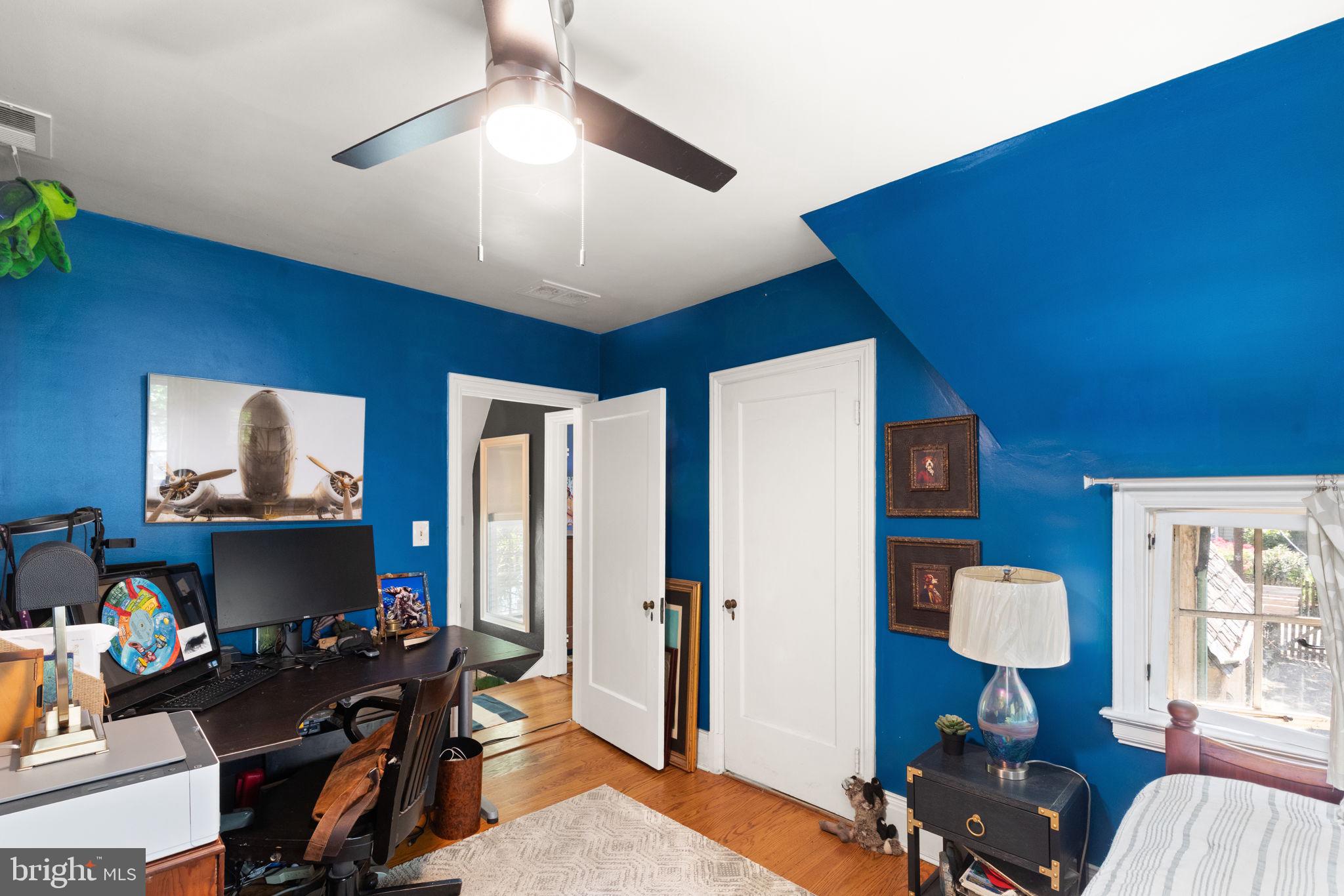 311 Taplow Road Baltimore, MD 21212 - Photo 22 of 32 a view of a workspace with furniture and a window
