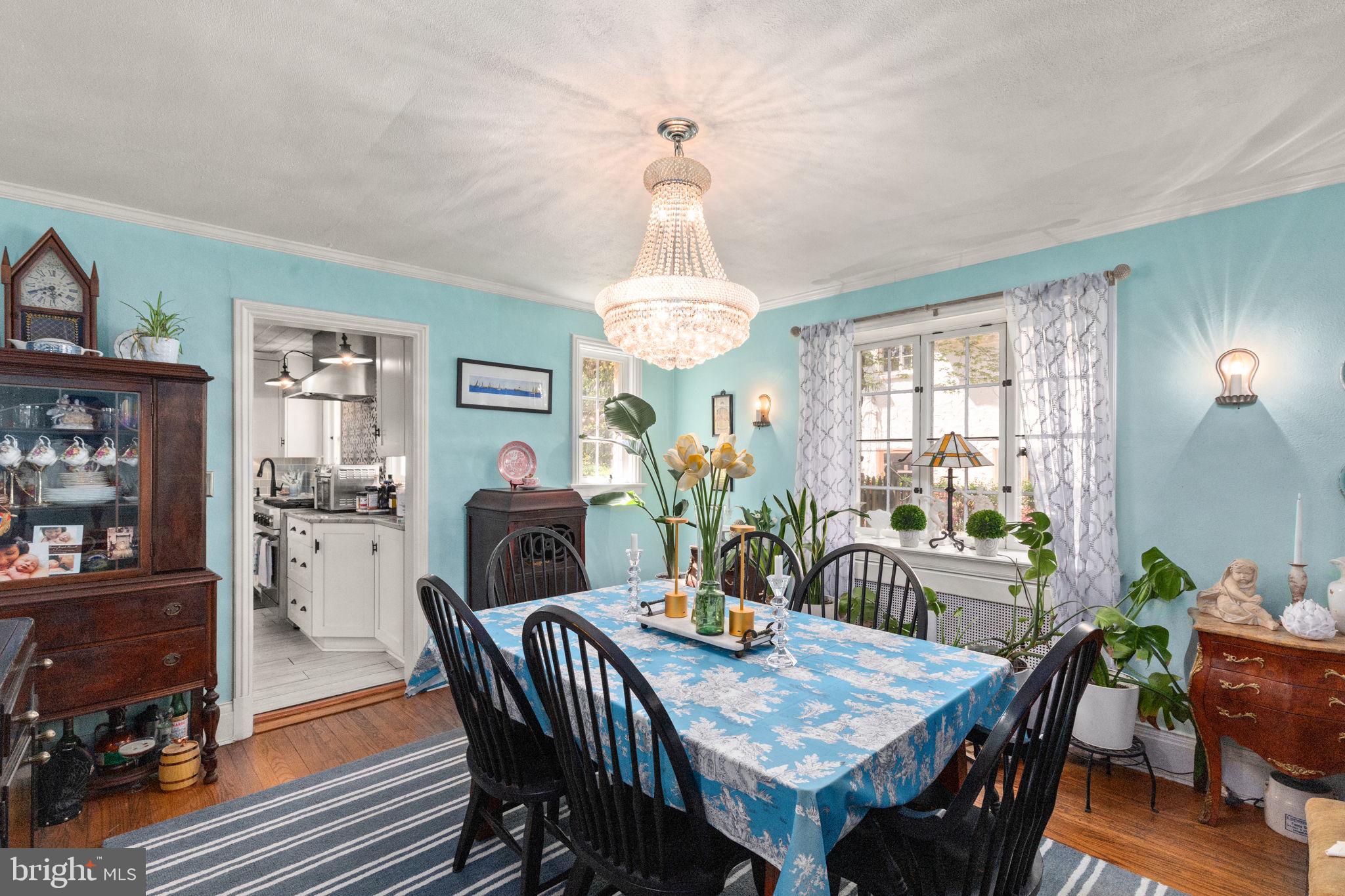 311 Taplow Road Baltimore, MD 21212 - Photo 8 of 32 a view of a dining room with furniture window and wooden floor
