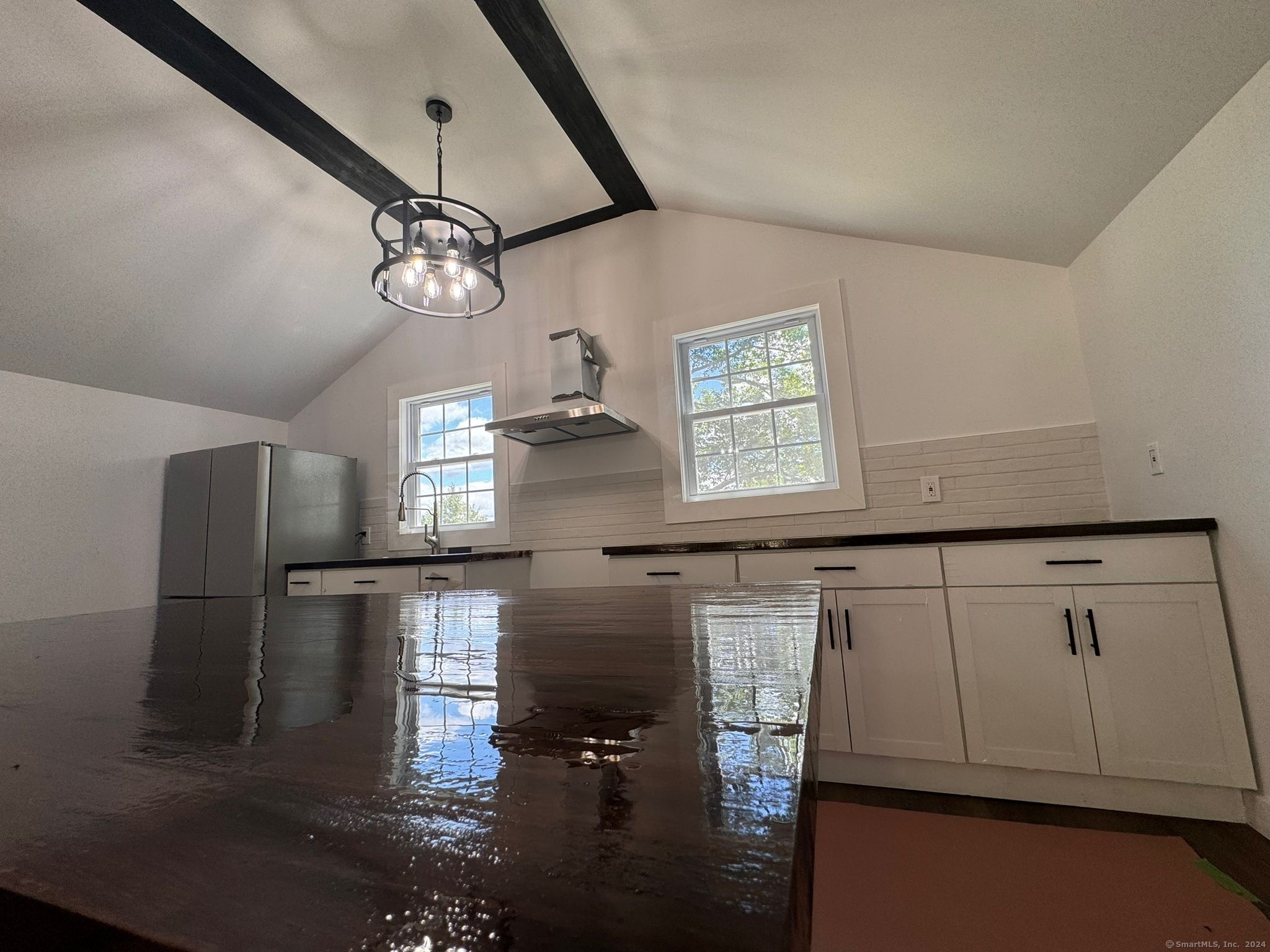 22 Hemlock Trail Newtown, CT 06482 - Photo 13 of 31 a kitchen with stainless steel appliances a refrigerator and a stove top oven