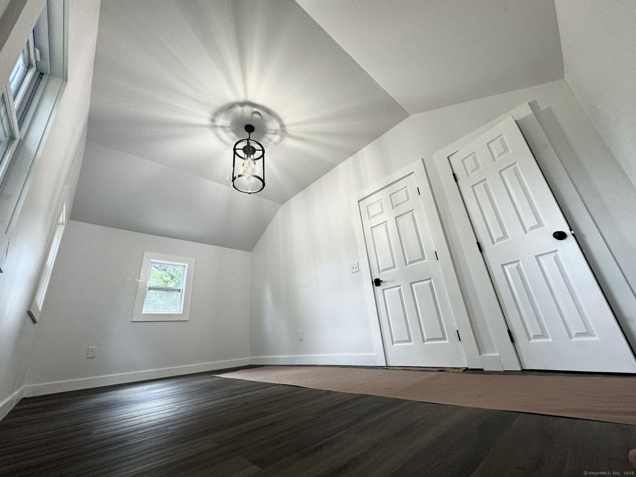22 Hemlock Trail Newtown, CT 06482 - Photo 16 of 31 a view of staircase with wooden floor and white walls
