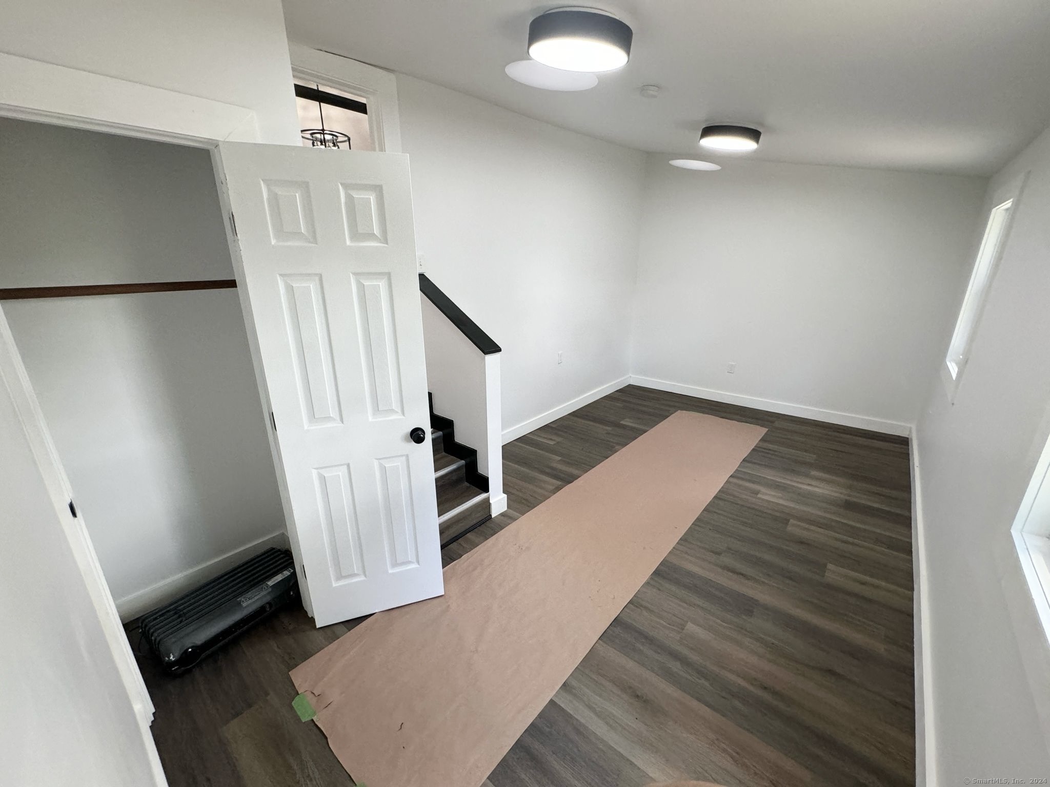 22 Hemlock Trail Newtown, CT 06482 - Photo 22 of 31 a view of a hallway with staircase