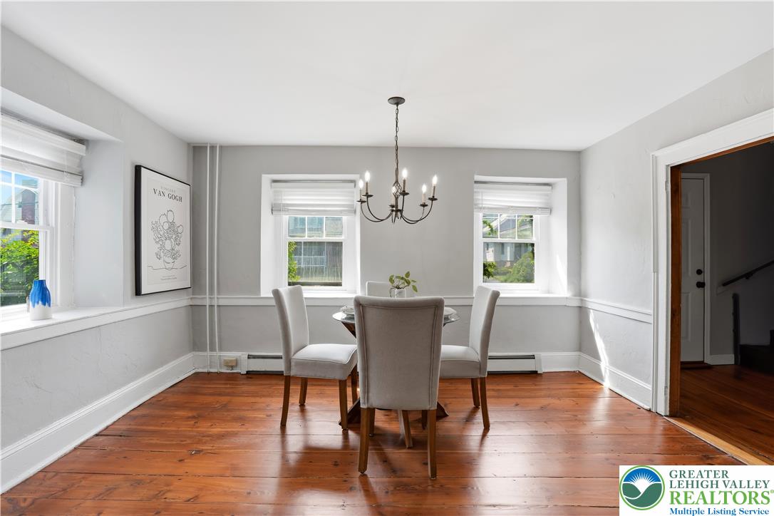2014 Linden Street Bethlehem, PA 18017 - Photo 12 of 85 Hardwood floors and generous windows elevate this inviting dining space, ready for memorable meals.