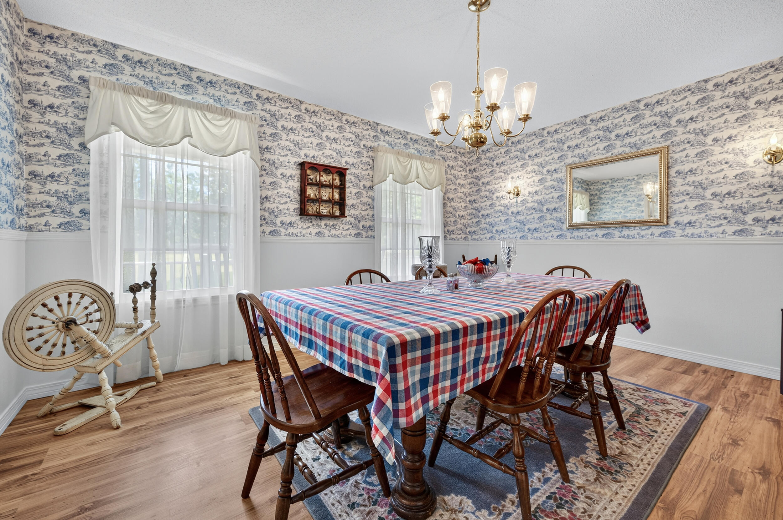 5378 Staghorn Road Crestview, FL 32539 - Photo 11 of 130 a dining room with furniture window and wooden floor