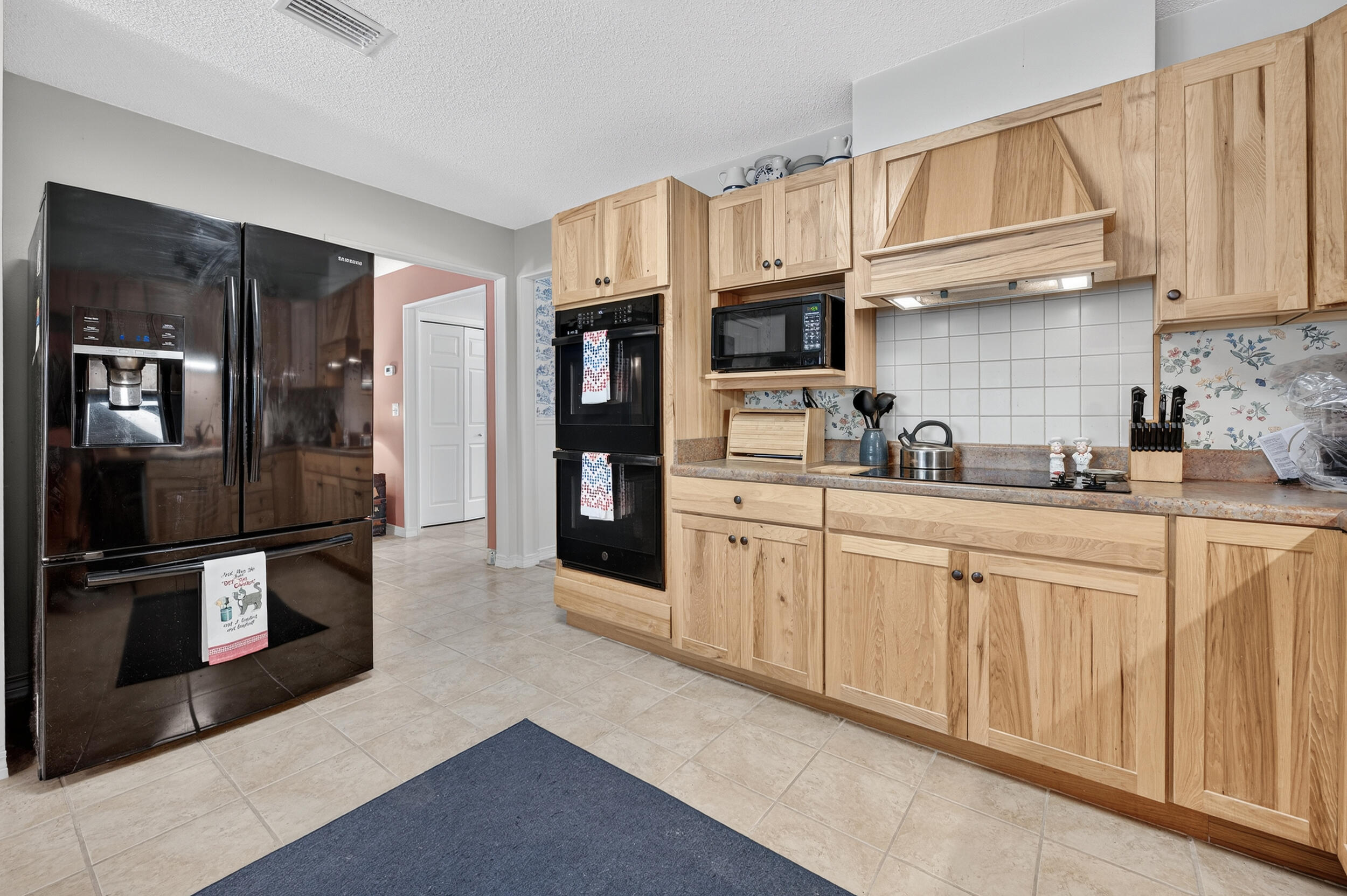5378 Staghorn Road Crestview, FL 32539 - Photo 20 of 130 a kitchen with stainless steel appliances granite countertop a refrigerator and a sink