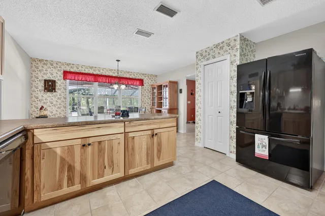 a view of a workspace with furniture