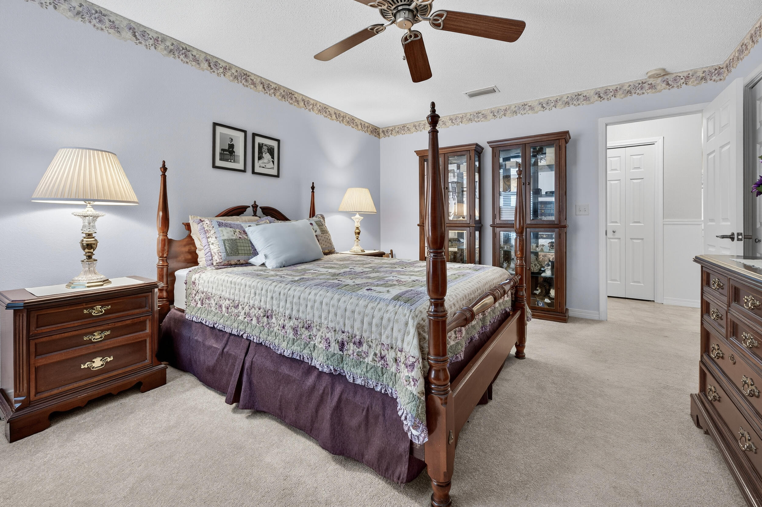 5378 Staghorn Road Crestview, FL 32539 - Photo 32 of 130 a bedroom with a bed and a lamp on the dresser