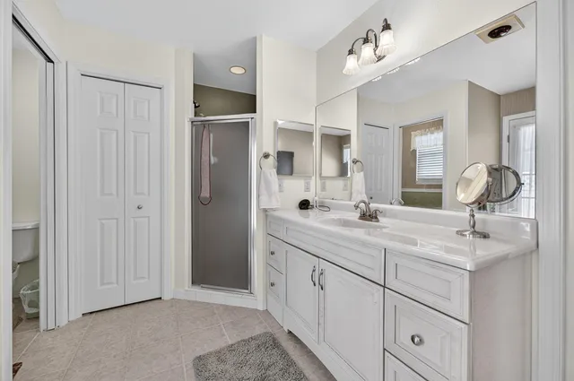 a backyard of a house with outdoor seating