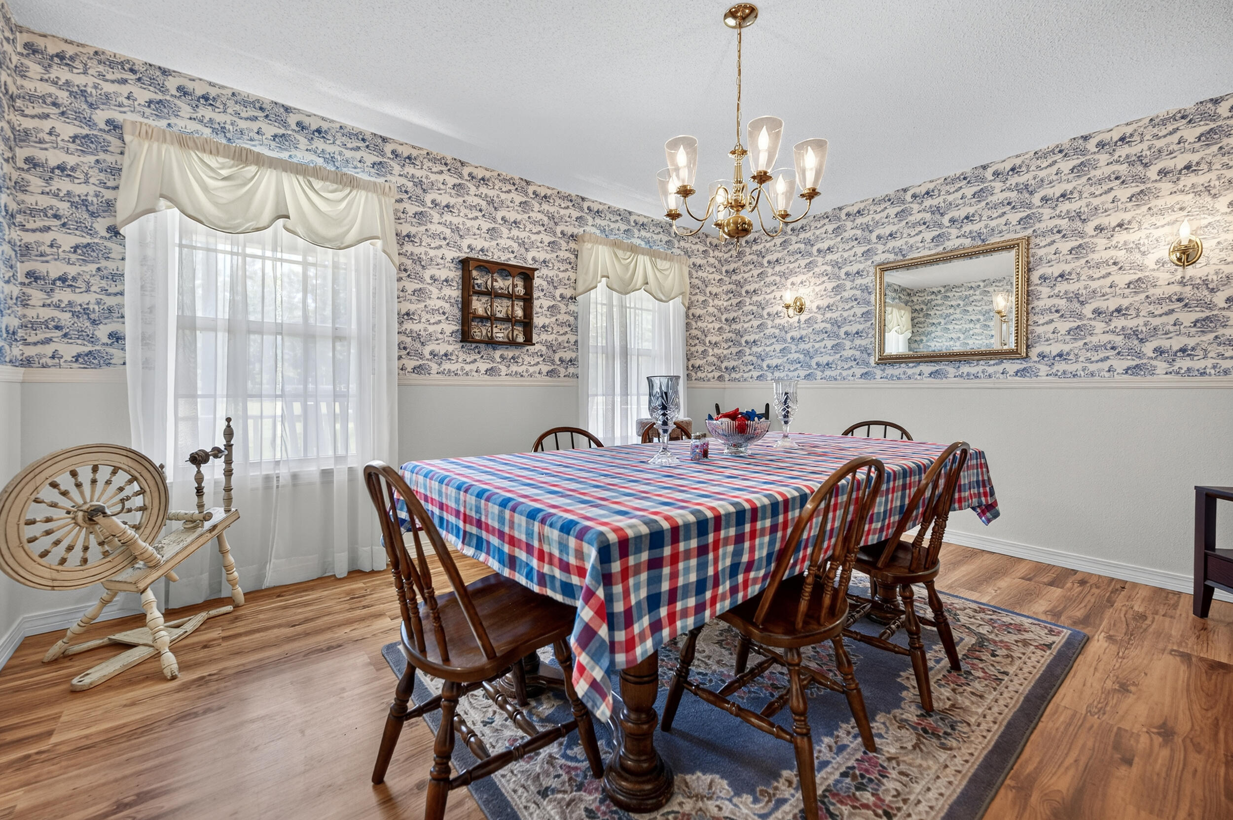 5378 Staghorn Road Crestview, FL 32539 - Photo 47 of 130 a dining room with furniture window and wooden floor