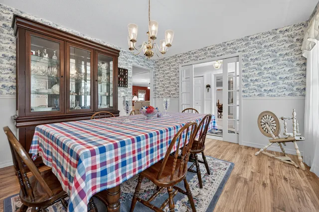 a view of a city with lush green forest