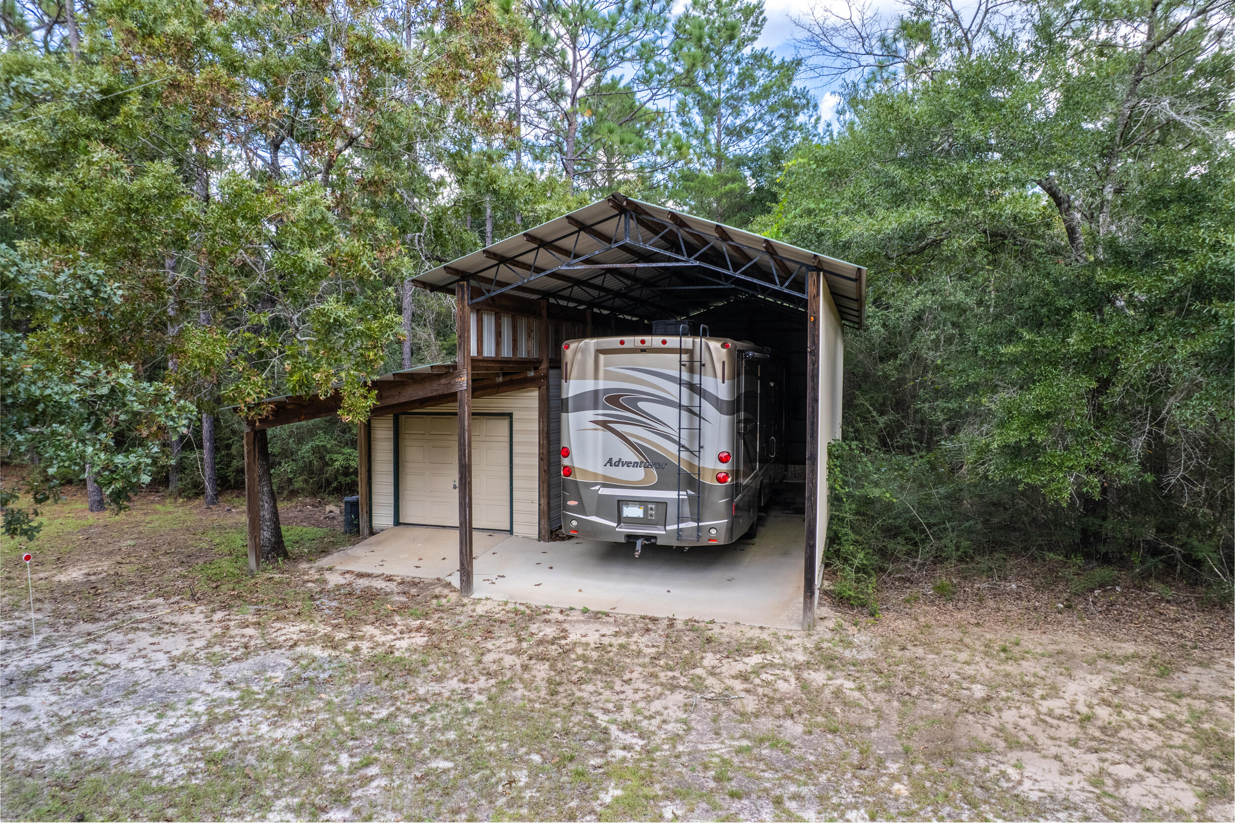 5378 Staghorn Road Crestview, FL 32539 - Photo 5 of 130 a car parked in front of a house