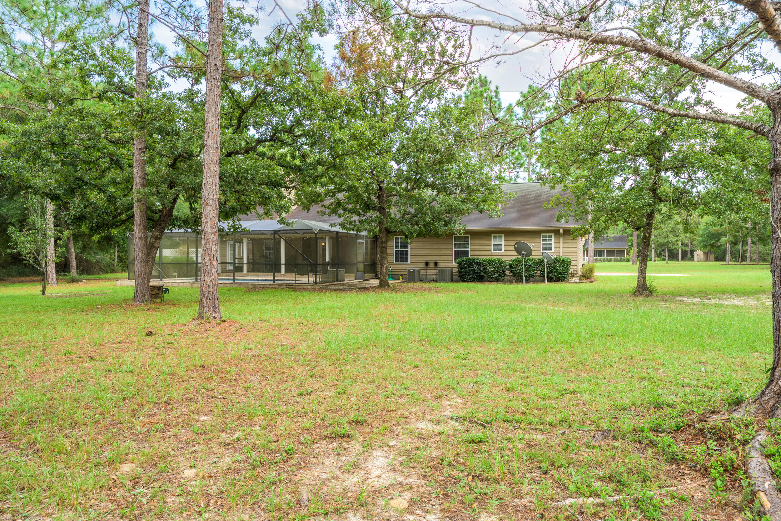 5378 Staghorn Road Crestview, FL 32539 - Photo 64 of 130 a front view of house with yard and green space
