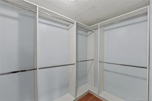 a view of an empty walk in closet