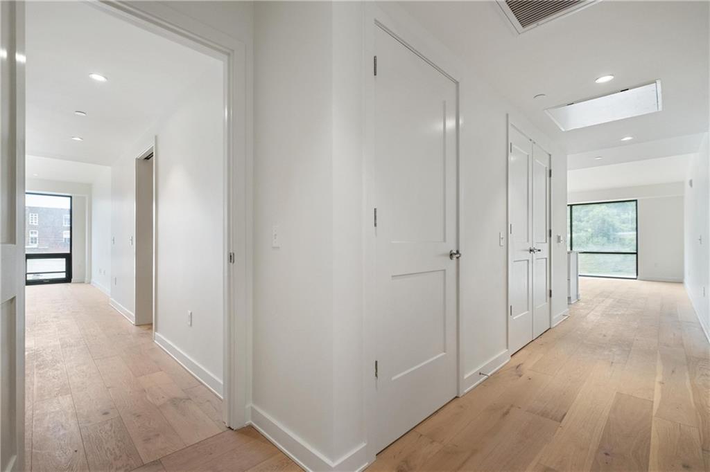 2330 Penn Avenue, Unit 302 Pittsburgh, PA 15222 - Photo 11 of 27 a view of hallway with wooden floor
