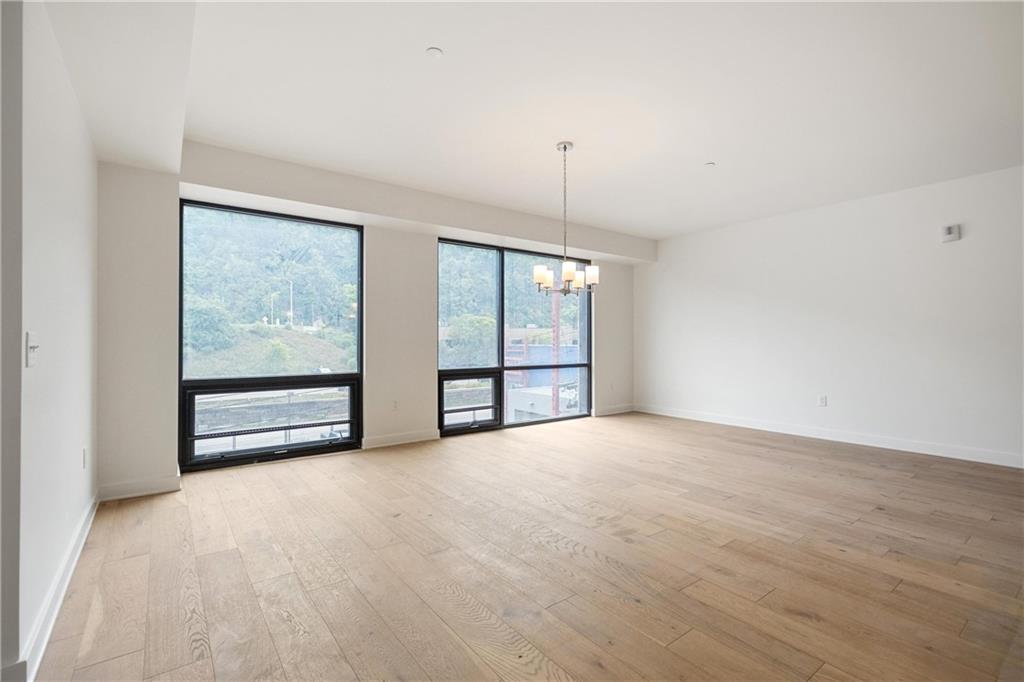 2330 Penn Avenue, Unit 302 Pittsburgh, PA 15222 - Photo 12 of 27 a view of an empty room with a window