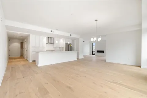 a view of a kitchen with a sink
