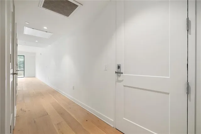 a view of small space with wooden floor