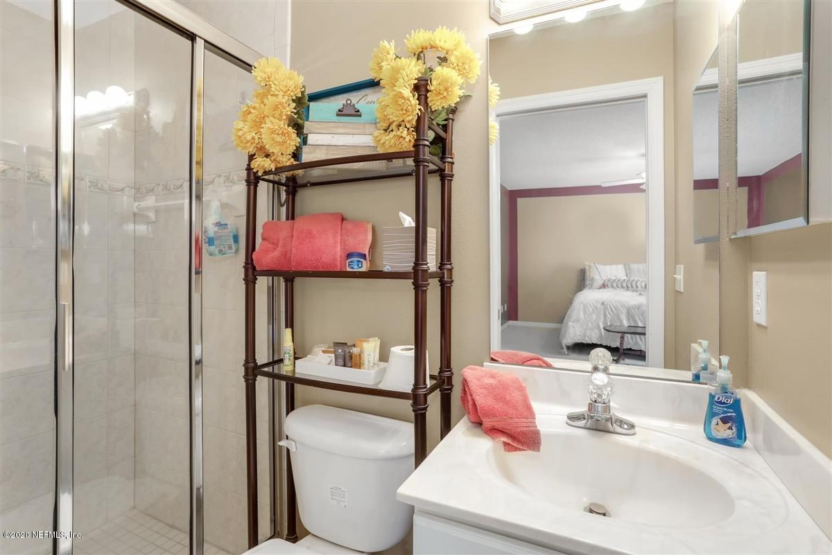 3317 Kings Road South St. Augustine, FL 32086 - Photo 20 of 32 a bathroom with a sink toilet and shower