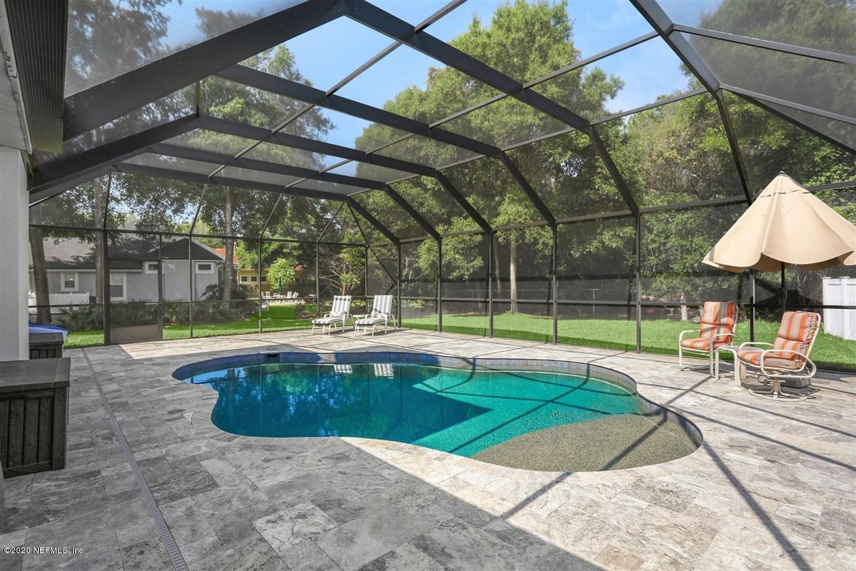 3317 Kings Road South St. Augustine, FL 32086 - Photo 25 of 32 a view of a swimming pool with a patio