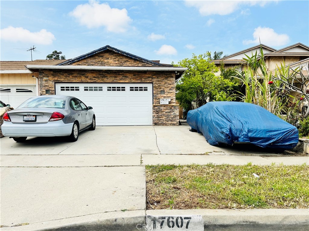 17607 Amantha Avenue Carson, CA 90746 - Photo 1 of 1 a view of a car parked in front of a building