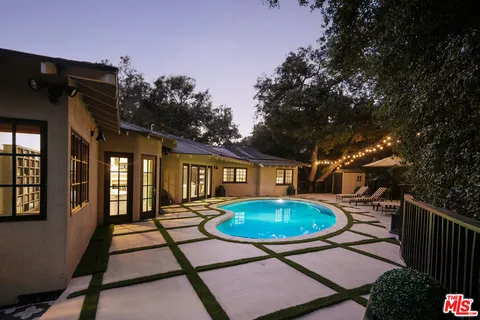 a view of outdoor space yard deck patio and outdoor kitchen