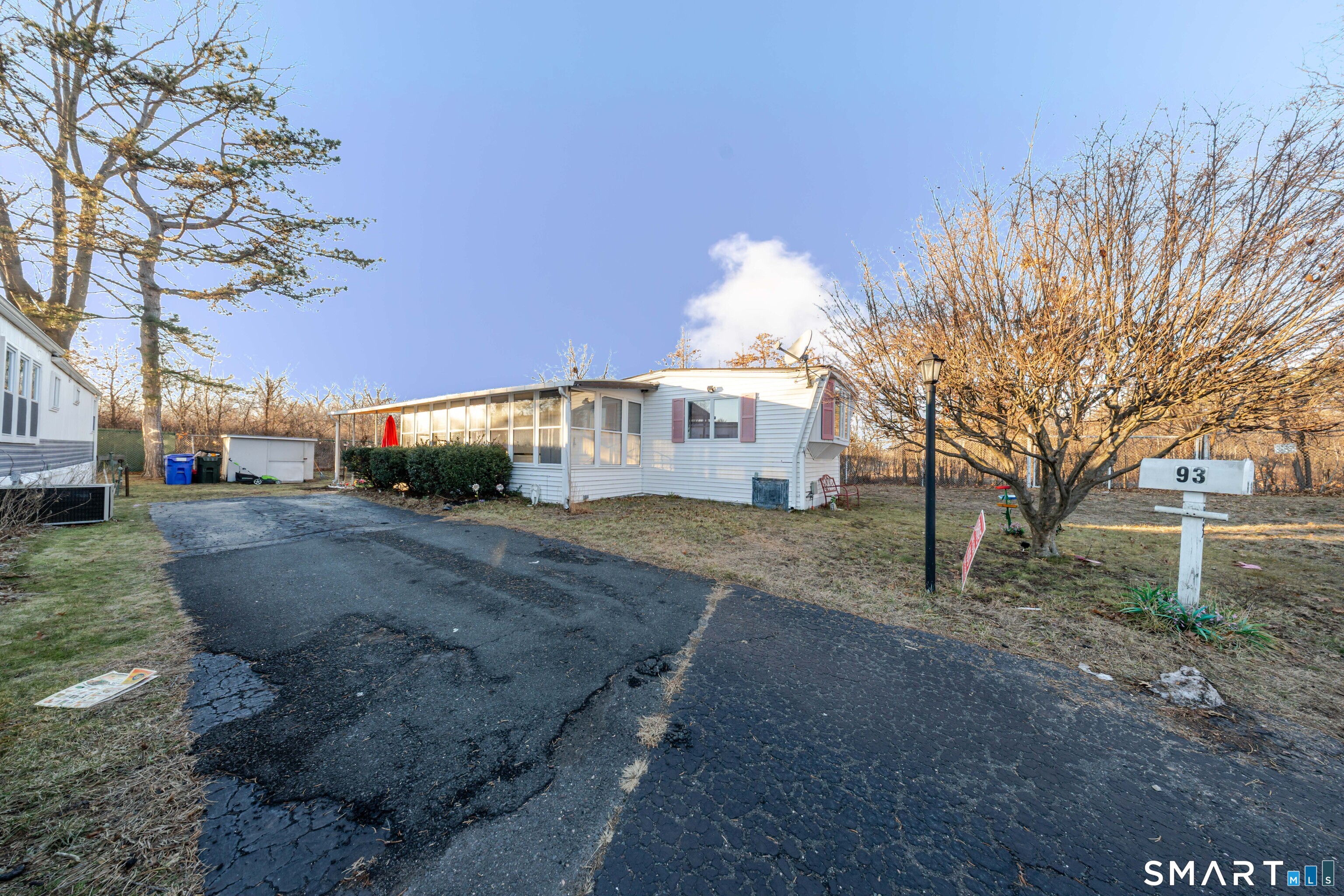 93 Shawnee Road East Hartford, CT 06118 - Photo 24 of 37 a view of a street with a building in the background